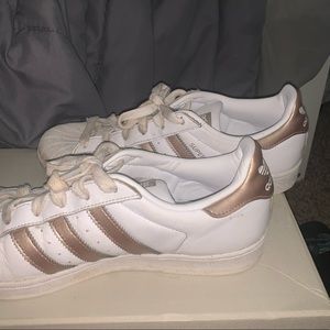 Rose gold Adidas Superstars